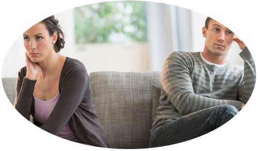 woman and man sitting far apart during counseling session